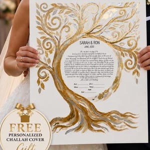 May include: A white rectangular ketubah featuring a large, hand-painted gold and silver tree with swirling branches. The center contains the text SARAH & RON JUNE 2020, followed by a paragraph of English text, signature lines, and a circular gift tag.