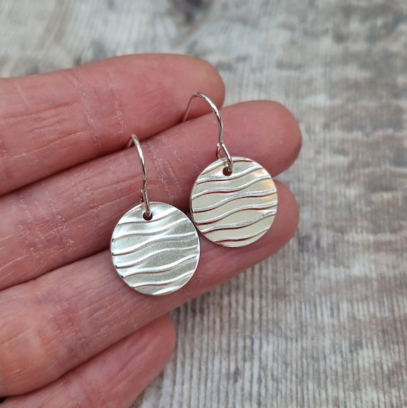 Silver disc earrings deals
