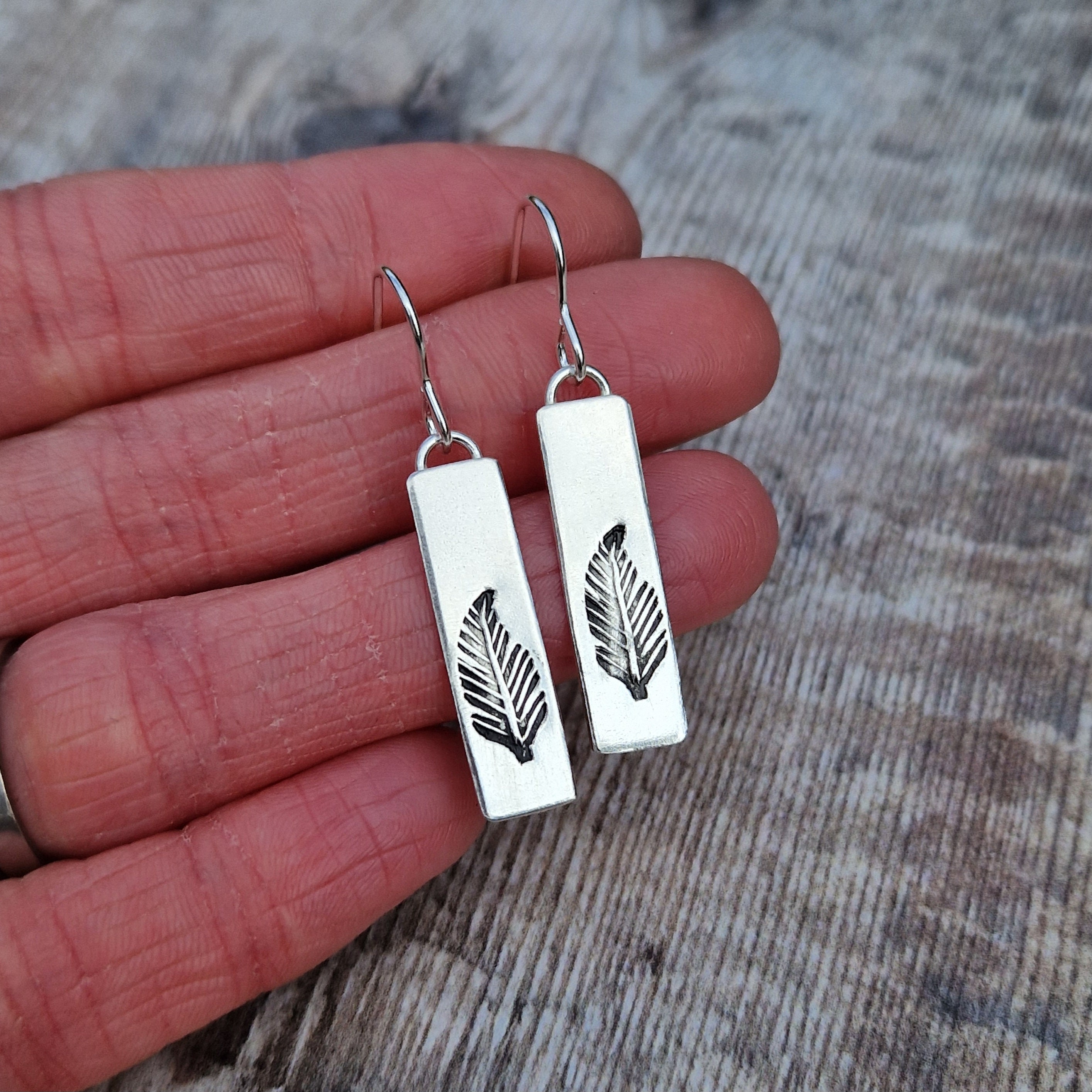 Wampam post feather earrings. – Littletree wampum