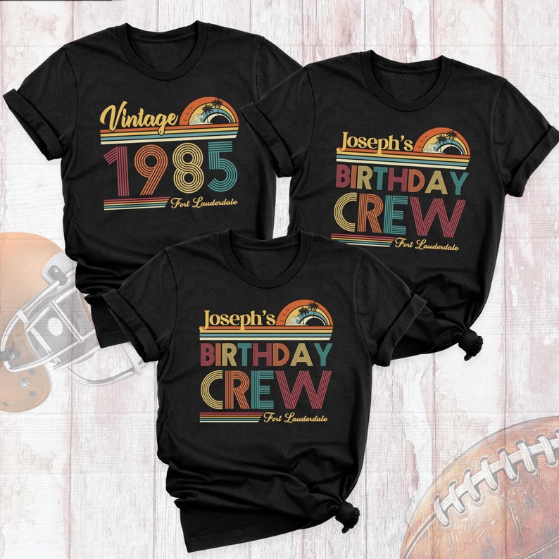 May include: Three black t-shirts with a vintage style design. The first shirt says "Vintage 1985 Fort Lauderdale". The second and third shirts say "Joseph's Birthday Crew Fort Lauderdale".