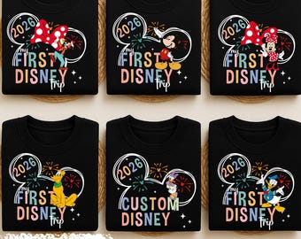 May include: Six black crewneck sweatshirts featuring graphic prints of Disney characters. Each design includes the text 'MY FIRST DISNEY TRIP' or 'CUSTOM DISNEY' with the year 2026, fireworks, and a Mickey Mouse ear silhouette outline.