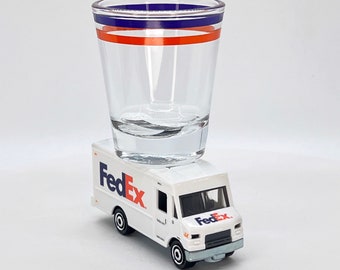 the Original Hot Shot shot glass, FedEx Express Delivery Truck, Matchbox Vehicle