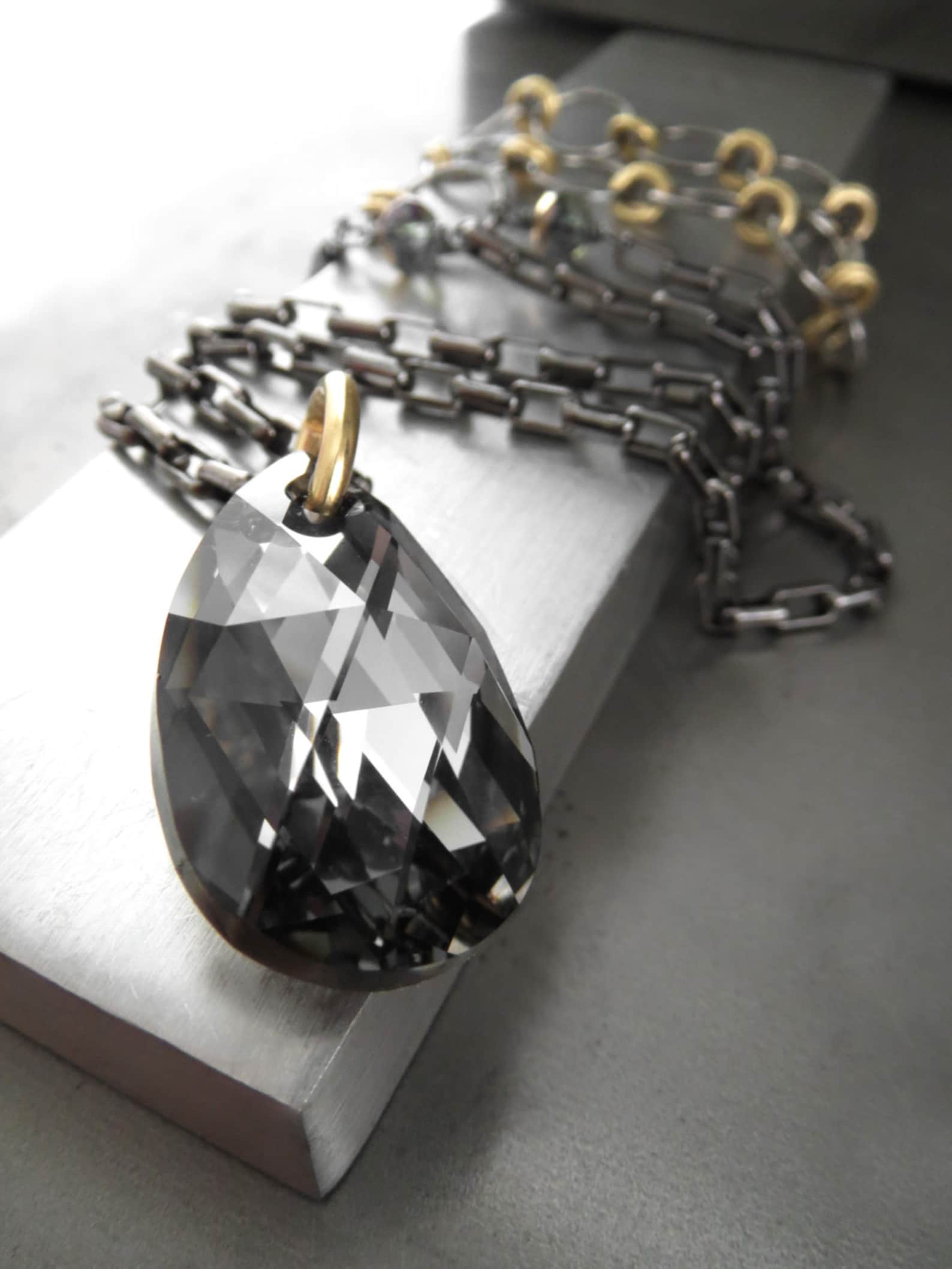Black Crystal Teardrop Pendant Necklace With Gold Accents Etsy