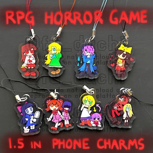 May include: A collection of 1.5-inch phone charms featuring colorful cartoon characters. The charms have a clear background and are attached to a lanyard. Text on the image reads "RPG HORROR GAME".