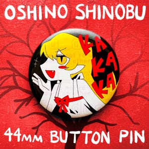 May include: A 44mm button pin featuring an anime character with yellow hair and a red bow. The pin has the text "OSHINO SHINOBU" at the top and "KAKA" in red. The background is red with a tree branch design.