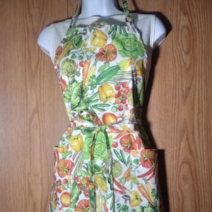 Apron with Nature's Bounty print 100% cotton fabric by Robert Kaufmann long ties adjustable neck loop two large pockets