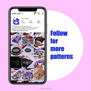 May include: A smartphone displays an Instagram profile with cross-stitch items and patterns. The profile includes a grid of photos showcasing various cross-stitch projects, with the text "Follow for more patterns" on a pink background.