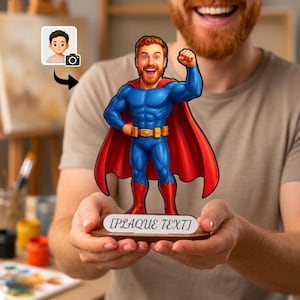 May include: A custom superhero figurine featuring a cartoon-style character with a red beard, wearing a blue suit with a red cape, gold belt, and red boots. The figure stands on a wooden base with a white plaque displaying the text [PLAQUE TEXT].