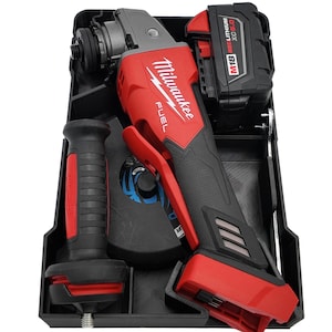 May include: A red and black Milwaukee FUEL angle grinder with a battery and handle, stored in a black case. The grinder has a red trigger and a black grip. The battery is labeled "M18 REDLITHIUM XC5.0".