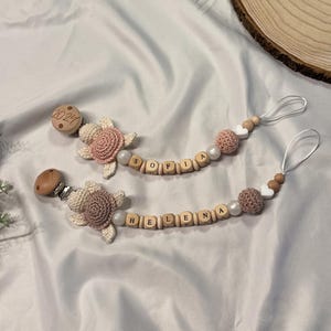 Schnullerkette personalisiert Spieluhr Schildkröte Baby Kinderwagenkette Schlüsselanhänger