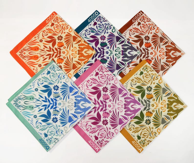 May include: Six colorful fabric squares with a floral pattern. Each square has a different color and pattern, and each square has a number printed on it. The numbers are 4055J, 4055D, 4055H, 4055Q, 4055K, and 4055A.