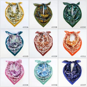 May include: Nine different patterned silk scarves in various colors, including yellow, green, blue, red, and pink. Each scarf has a unique floral design.