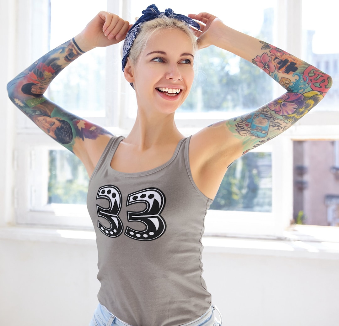 値下げ！ナゴンスタンス　24ss 新作　Drape tank top Black tank top with signature piercing – Rabanne