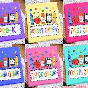 May include: Six rectangular fabric panels in purple, yellow, pink, blue, magenta, and teal. Each features a cartoon school supply graphic and text reading PRE-K, KINDERGARTEN, FIRST GRADE, SECOND GRADE, THIRD GRADE, or FOURTH GRADE in rainbow colors.