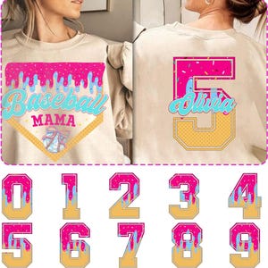 May include: Two beige sweatshirts with a baseball theme. One sweatshirt has the text "Baseball Mama" with a baseball and a dripping ice cream cone design. The other sweatshirt has a large number "5" with a dripping ice cream cone design and the text "Olivia".  There are ten separate images of numbers 0-9 with a dripping ice cream cone design.