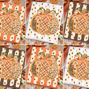 May include: A set of six square fabric napkins featuring a central pumpkin illustration with a peach-coloured bow. Each pumpkin is divided into segments with leopard print, plaid, and floral patterns. The backgrounds feature various striped designs.