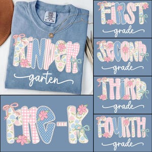 May include: A light blue Comfort Colors t-shirt with the word "Kindergarten" in a patchwork design with pink and blue floral accents. The shirt also features a gold necklace. Additional images show "First Grade", "Second Grade", "Third Grade", and "Fourth Grade" designs.