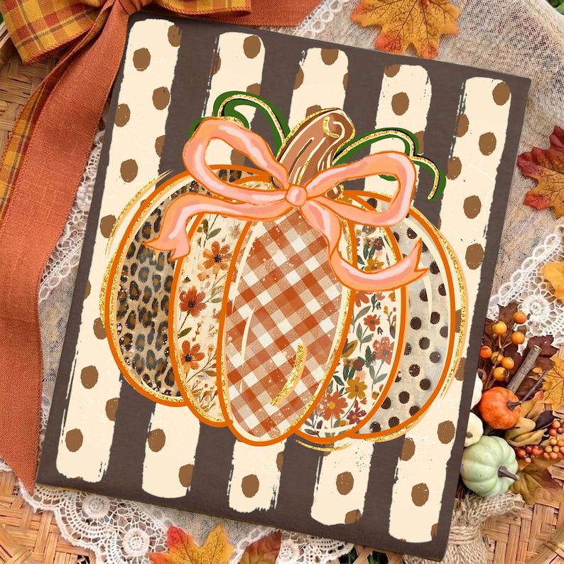 May include: A rectangular sign featuring a central pumpkin illustration with a light orange bow. The pumpkin segments display leopard print, floral patterns, and orange gingham. The background consists of vertical brown and cream polka dot stripes.