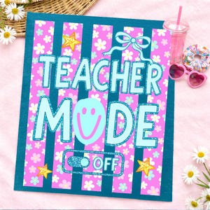 May include: A pink and teal Teacher Mode sign with a floral pattern and the words "Teacher Mode" in large, glittery letters. The sign has a smiley face and an "OFF" switch. Accessories include heart-shaped sunglasses and a pink drink.