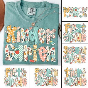 May include: A seafoam green t-shirt with the words "Kindergarten" in a colorful, patterned design. The shirt also features a silver necklace. Additional images show "Pre-K" through "Fifth Grade" in similar styles.