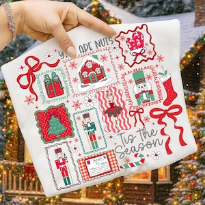 May include: White Christmas pillowcase with a festive design. The pillowcase features various holiday illustrations, including a gingerbread house, nutcrackers, a Christmas tree, and the text "You are nuts, Tis the Season". The design is in red, green, and white.