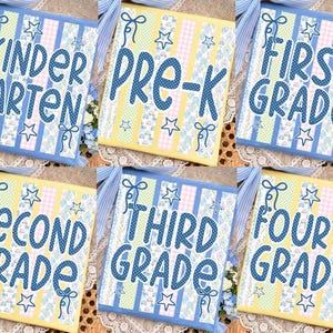May include: A set of six decorative signs for school grades, including "Kindergarten", "Pre-K", "First Grade", "Second Grade", "Third Grade", and "Fourth Grade". Each sign features blue text with star accents on a patchwork background of pastel colors.
