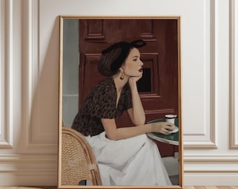 May include: A framed art print showing a woman at a cafe table. She wears a leopard print top, white skirt, and a black headband. The background features a red door and a green table. The artwork is in a vintage style.