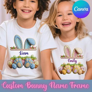 Puede incluir: Camisetas blancas con diseños de Pascua. Una camiseta presenta orejas de conejo azules y huellas de patas, la otra rosa y amarilla. Cada camiseta tiene un nombre, Liam y Emily, y el texto "Custom Bunny Name Frame".