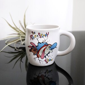 Vintage "Smashed" Red & Stimpy Show Tasse von Dakin für Nickelodeon, lustige 90er Jahre Kindheit, skurrile Küche, weiße Keramik Kaffeetasse, Grafik