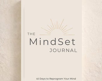 May include: A cream-colored journal titled "The MindSet Journal" with gold accents and text that reads "A Daily Journal for Clarity & Reflection" and "40 Days to Reprogram Your Mind". The cover features a sunburst design.