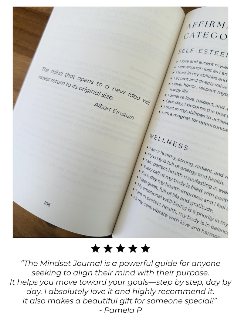 May include: An open book with text from "The Mindset Journal" is displayed. The pages show affirmations for self-esteem and wellness. A quote by Albert Einstein is also visible: "The mind that opens to a new idea will never return to its original size."