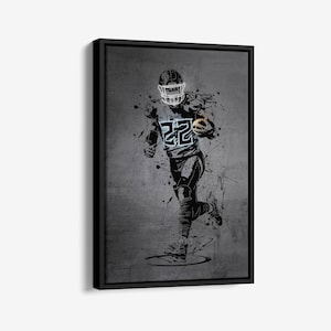 May include: A black and white illustration of a football player running with the ball. The player is wearing a helmet and jersey with the number "22" on it. The background is a gray, textured surface with black splatters of paint.