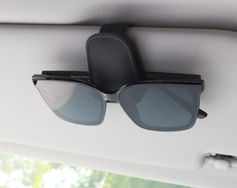 Soporte de gafas de cuero magnético para parasoles de coche, soporte para gafas de sol