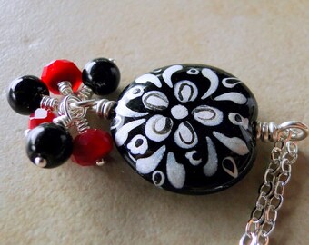 Hand Painted Glass Bead Necklace With Multi Faceted Red And Black Glass Beads