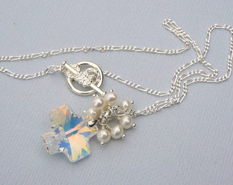 Swarovski Crystal Cross Necklace With A Cluster Of Freshwater Pearls