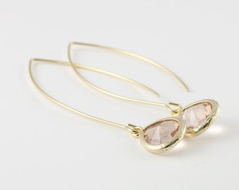 Pastel Peach Glass Earrings With A Shiny Gold Plated Frame