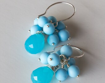 Sterling Silver Wire Wrapped Earrings With Cobalt Blue Chalcedony Briolette, Accompanied By A Pastel Blue Cluster