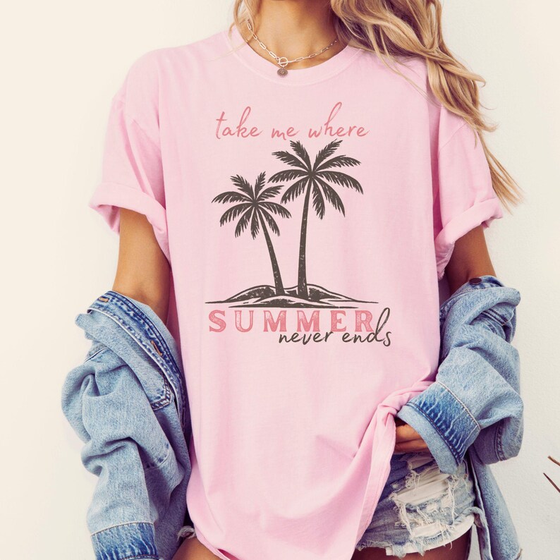 Retro beach graphic t-shirt featuring two vintage-style palm trees with the phrase “take me where summer never ends”