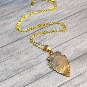 Gold Trimmed Flint Arrowhead Necklace: Minimalist Protection Amulet