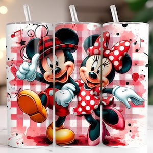 May include: Three white tumblers with red and white checkered backgrounds and images of Mickey Mouse and Minnie Mouse. Mickey Mouse is wearing a red and black hat and Minnie Mouse is wearing a red bow.