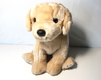 large stuffed yellow lab