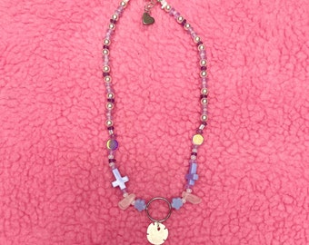 Collier coquillage violet en cristal