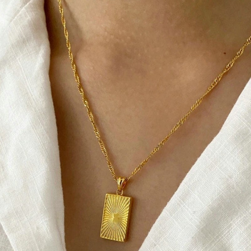 Grayson Gold Sunburst Frame Short Pendant Necklace in Red Glass main image 0