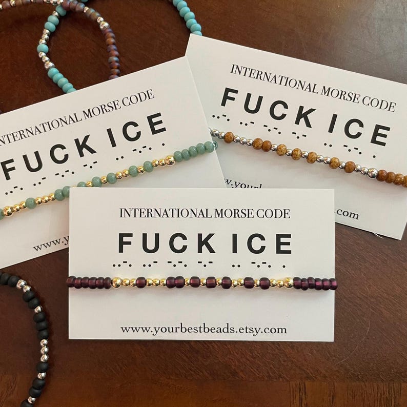 May include: Beaded bracelets with the text "FUCK ICE" in International Morse Code are displayed on white cards. The bracelets feature various bead colors, including green, brown, and purple, with gold-colored accents. The Etsy shop URL is visible.