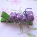 Reviewed by Anonymous reviewed LiliBug Purple \/ White Polka Dot Caterpillar Hair Clip