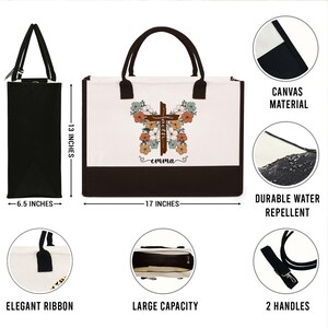 May include: A white canvas tote bag with brown trim and two black handles. The bag features a brown cross with floral accents and the text "faith" and "emma". The bag is 17 inches wide and 13 inches tall.