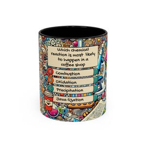 May include: A white ceramic coffee mug with a black interior, featuring a colorful, science-themed design. The mug has a question about chemical reactions in a coffee shop, with multiple-choice answers. The design includes lab equipment and coffee-related graphics.