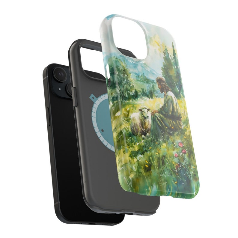 May include: A black phone case with a colorful image of a man sitting with a sheep in a field. The image is a watercolor painting with green grass, blue sky, and a bright sun.