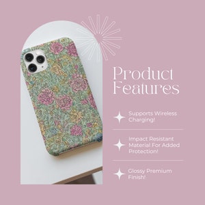 May include: A floral phone case with a green background and pink, yellow, and blue flowers. The case is compatible with wireless charging and is made from impact-resistant material for added protection. It has a glossy premium finish.