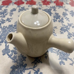 Elegante Keramik-Teekanne: Handgefertigter Teekessel aus Keramik, funktionell und stilvoll Bild 2